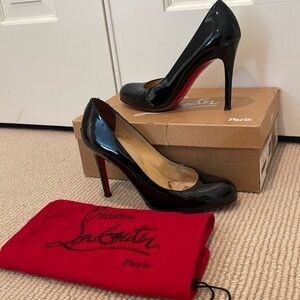 Christian Louboutin Simple Pump 100 in black patent calf. Size 36.